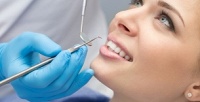 <b>Скидка до 83%.</b> Гигиеническая чистка зубов или лечение кариеса с установкой пломбы в стоматологической клинике «Дентал Бутик»