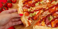 Пицца диаметром 30 см на тонком или традиционном тесте от службы доставки «Точно!Пицца» со скидкой 50%