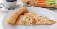 Вся пицца Trento в кафе Cinnabon со скидкой 50%