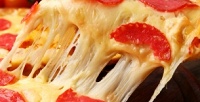 Сет от 5 больших пицц от службы доставки «Космопицца» со скидкой 40%