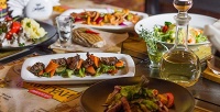 Блюда и безалкогольные напитки из меню ресторана-бара «Жигули» со скидкой 50%