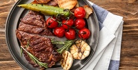 Все блюда из разделов меню «Балканские специалитеты на гриле» и «Домашние балканские специалитеты» без ограничения суммы чека в ресторане сербской кухни «Српска Кафана» со скидкой 50%