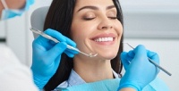 Ультразвуковая чистка зубов и чистка AirFlow в стоматологии «Астерия» (1480 руб. вместо 4000 руб.)