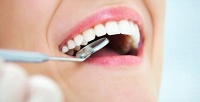 Лечение кариеса любой сложности, УЗ-чистка зубов, и другие услуги в медицинском центре «Омега». <b>Скидка до 91%</b>