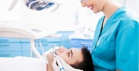 Комплексная УЗ-чистка зубов и лечение кариеса в стоматологии «Дентал Люкс». <b>Скидка до 65%</b>