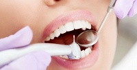 Лечение кариеса, восстановление или чистка зубов в клинике «Ниармедик». <b>Скидка до 83%</b>