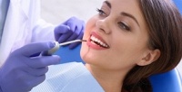 <b>Скидка до 70%.</b> Лечение кариеса или удаление зуба в стоматологии Dental Center