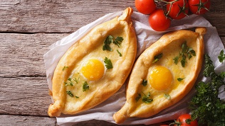 Пицца, пироги и хачапури от службы доставки Da Vinci со скидкой 50%