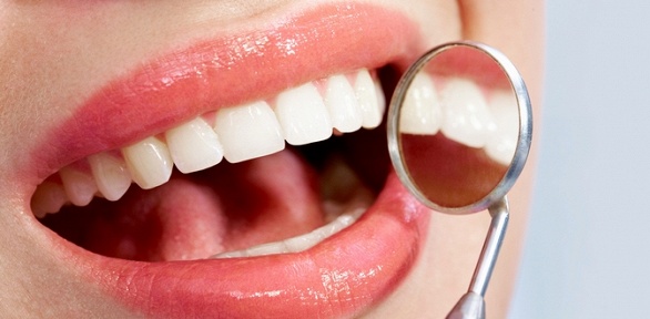 УЗ-чистка зубов, фторирование и полировка пастой от стоматологии «Денни»