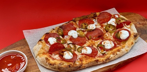 Всё меню пиццы в ресторане Duo Pizza and Wine за полцены